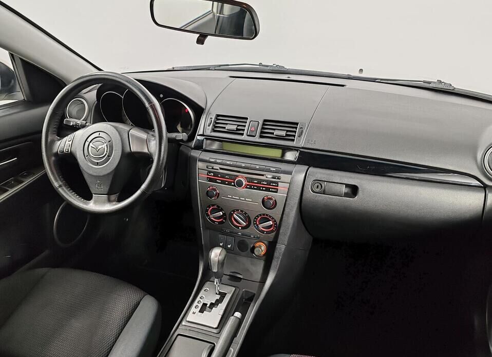 Mazda 3 1.6 AT (105 л.с.)