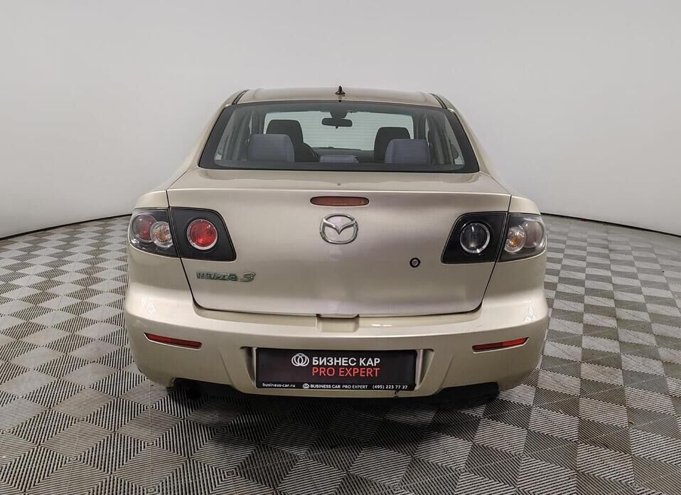 Mazda 3 1.6 AT (105 л.с.)