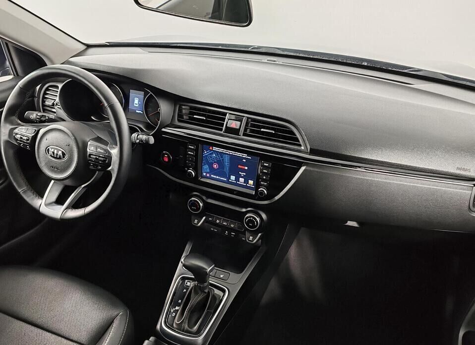 Kia Rio X-Line 1.6 AT (123 л.с.)