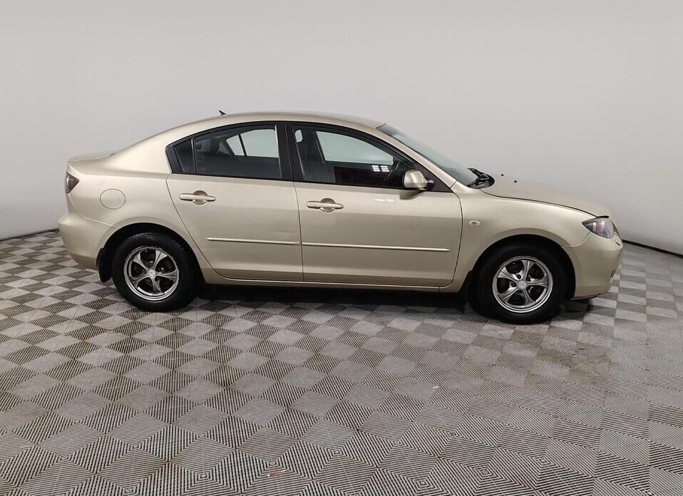 Mazda 3 1.6 AT (105 л.с.)