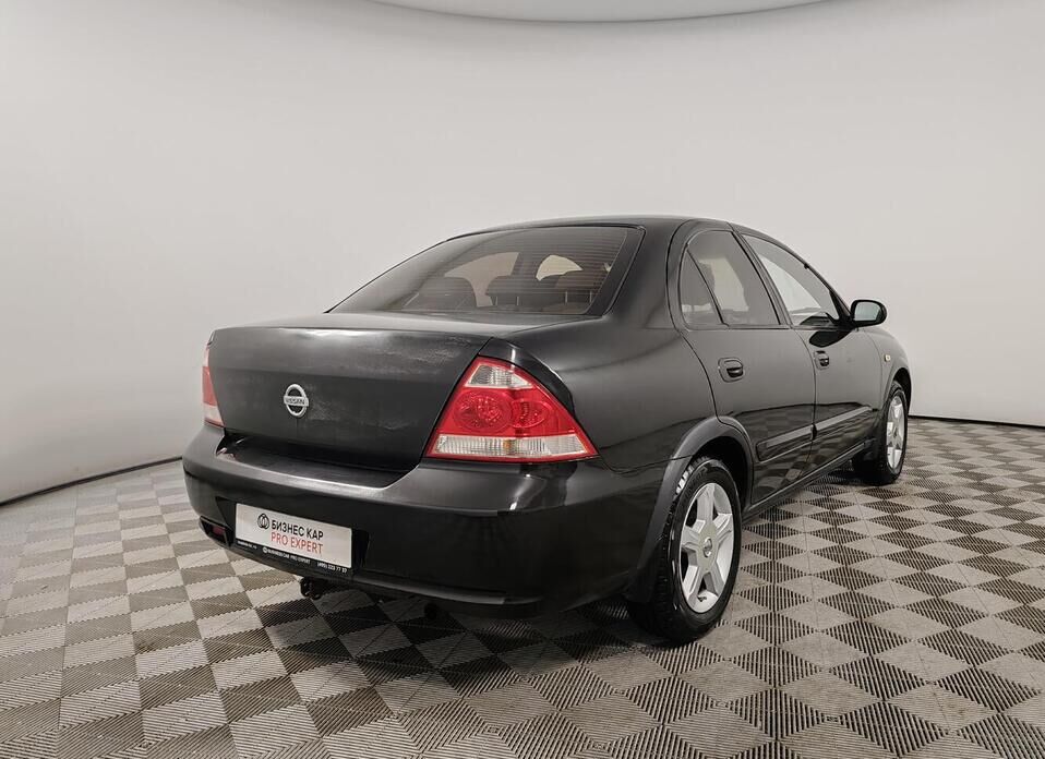 Nissan Almera Classic 1.6 MT (107 л.с.)