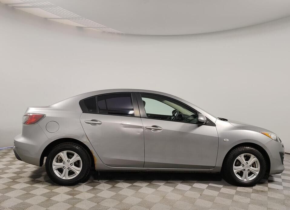 Mazda 3 1.6 AT (105 л.с.)