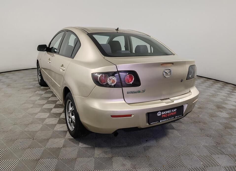Mazda 3 1.6 AT (105 л.с.)