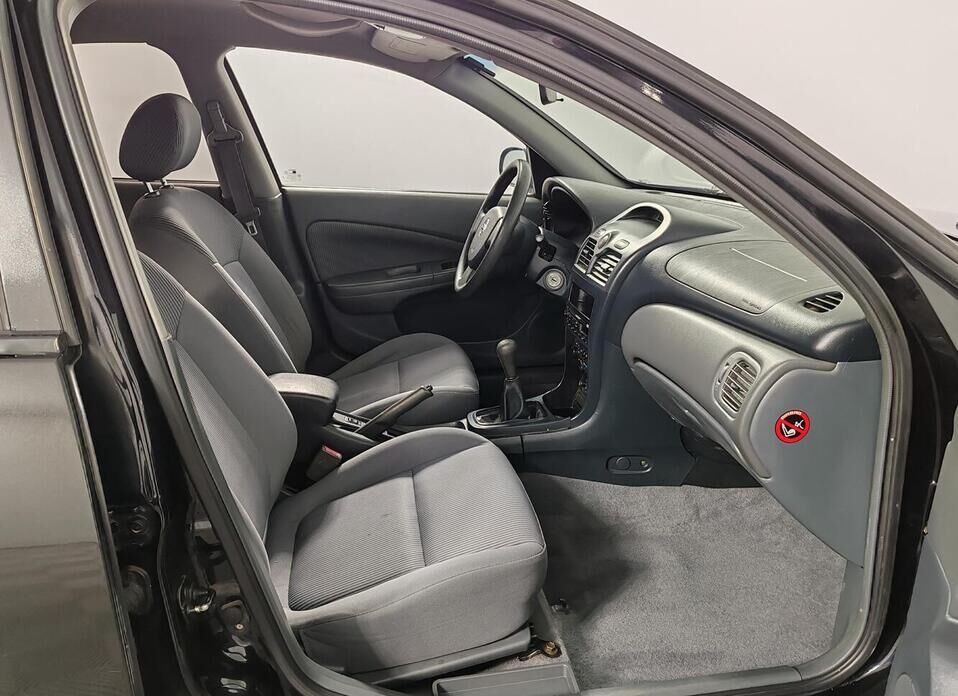 Nissan Almera Classic 1.6 MT (107 л.с.)