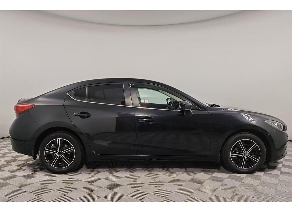 Mazda 3 1.6 AT (104 л.с.)