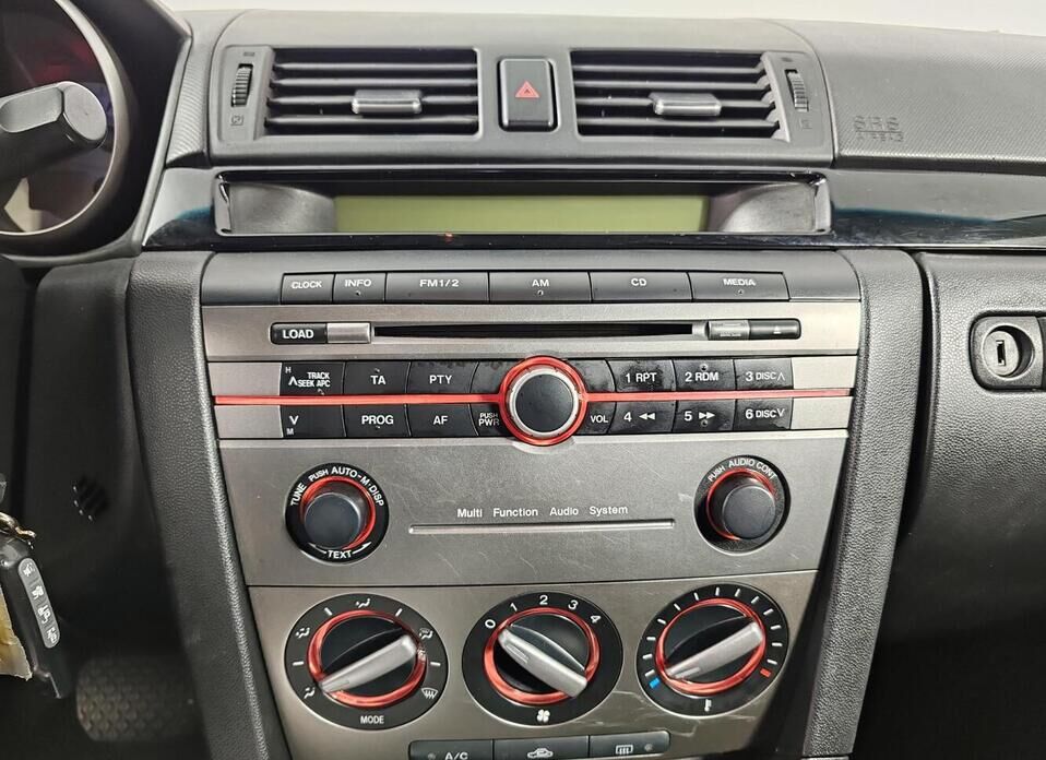 Mazda 3 1.6 AT (105 л.с.)